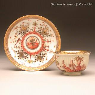 Tea bowl and saucer with children painted in the F.J.Ferner workshop