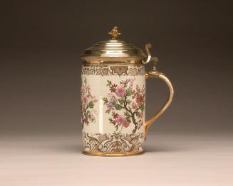 Tankard with relief moulding