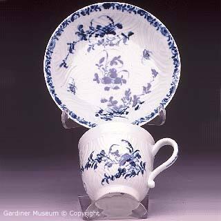Coffee cup and saucer with "The Feather Mould Floral" pattern
