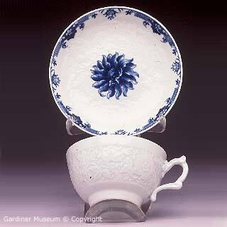 Teacup and saucer with "The Chrysanthemum" pattern