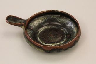 Set of eight shallow bowls with handles
