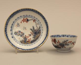 Tea bowl and saucer with Imari pattern