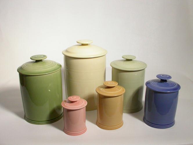 Set of three canisters (green, blue and pink)