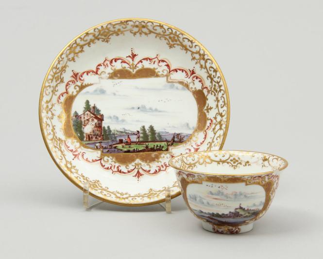 Teabowl and saucer with landscapes