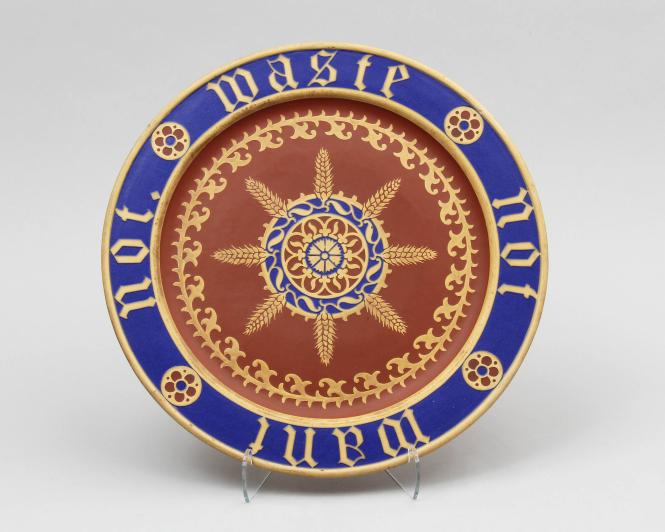 Bread plate with "Waste Not Want Not" inscription