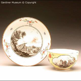 Teabowl and saucer with harbour scenes
