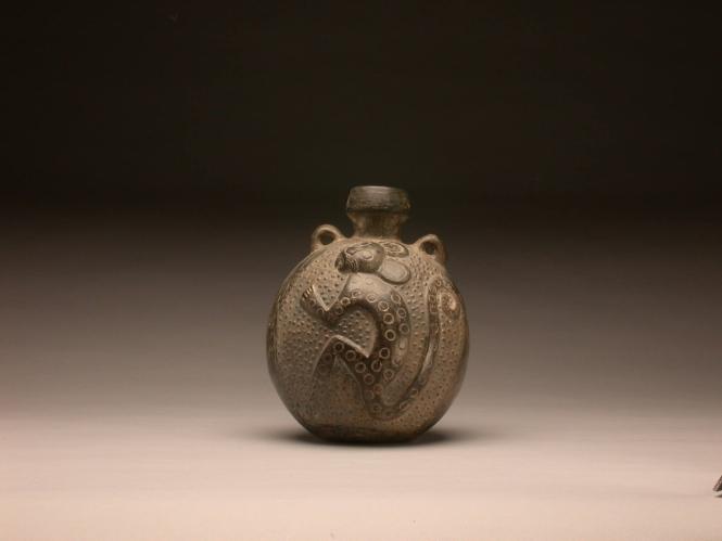 Jar with feline image
