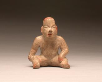 Small 'baby-face' figure