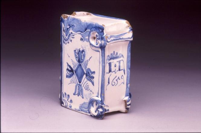 Hand warmer in the shape of a book (perhaps a prayer book)