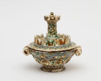 Bowl with a tower-shaped lid