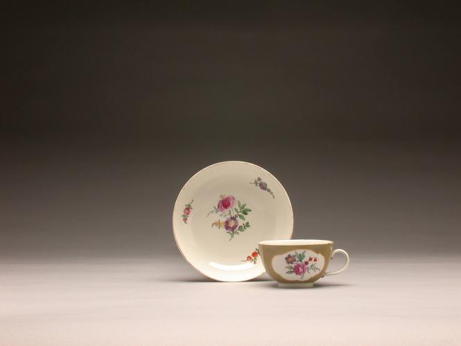 Cup and saucer with flowers