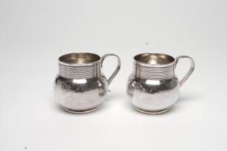 Pair of mugs with the arms of Luttrell of Dunster