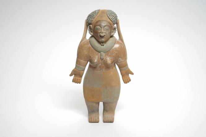 Standing female figure