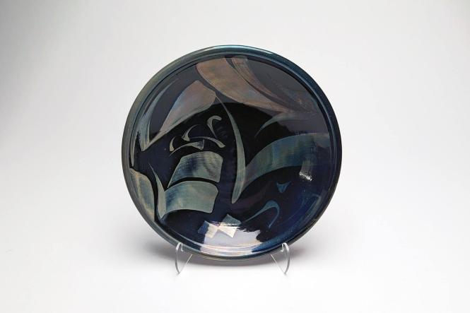 Plate with calligraphic design