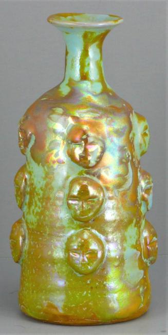 Bottle vase with masks