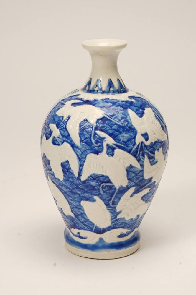Bottle with cranes