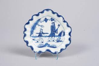 Pair of pickle dishes with golfer and caddy