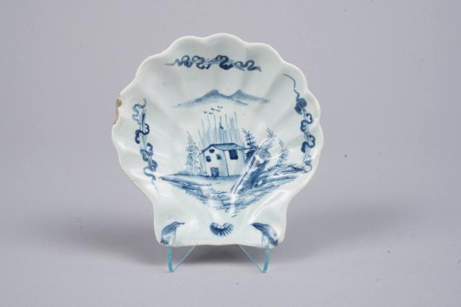 Shell-shaped dish with Building in a Landscape