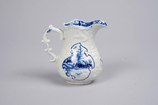 Milk Jug with Structure in Landscape