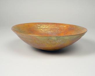 Shallow gold bowl