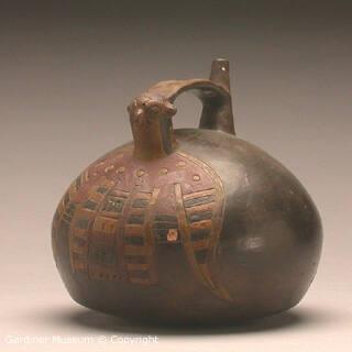 Laughing falcon effigy whistling bottle with bridge handle