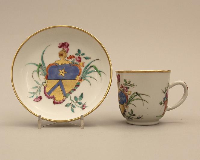 Cup and saucer with armorial crest