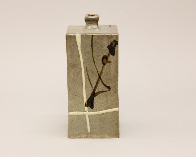 Square bottle with sugarcane